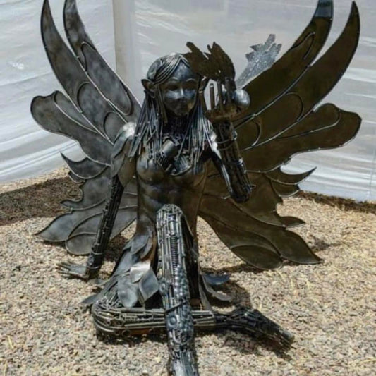 Sculpture métallique artisanale L’Éveil fée taille humaine en acier recyclé